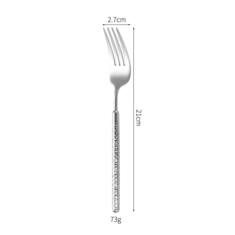 Elegant dessert spoon with elaborate handle design Stornfield