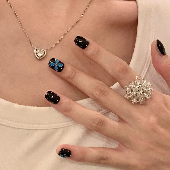 Artificial nails with colorful flower design Stornfield