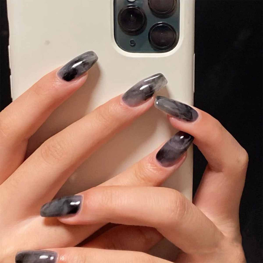 Artful Nail Extensions with Elegant Marble Design Stornfield