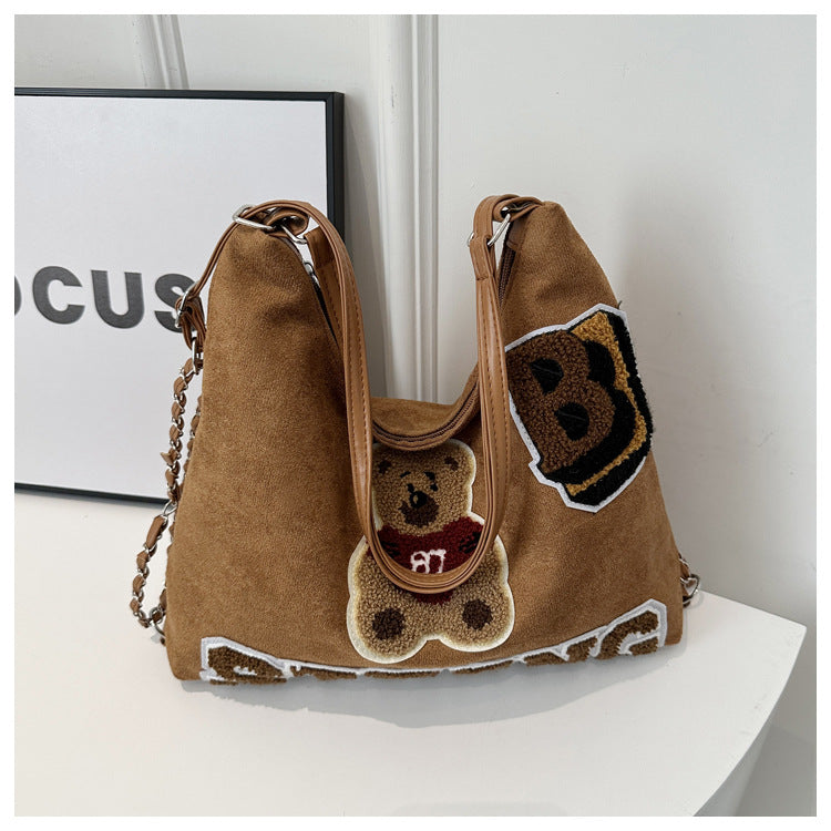 Shoulder bag in playful bear pattern Stornfield