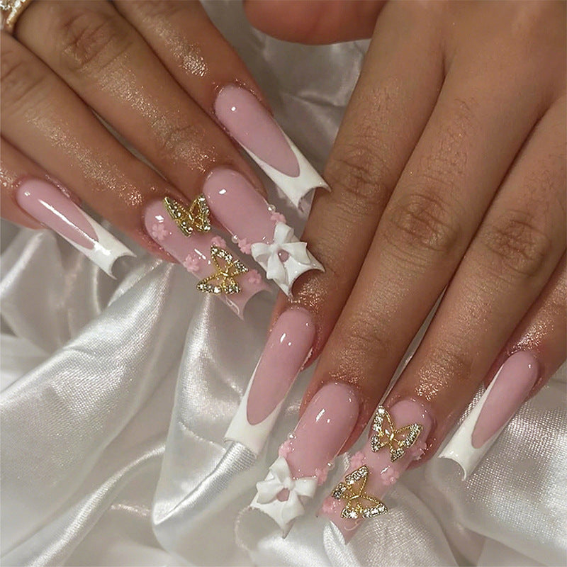 Decorative Press-On Nail Set with Floral and Butterfly Accents Stornfield