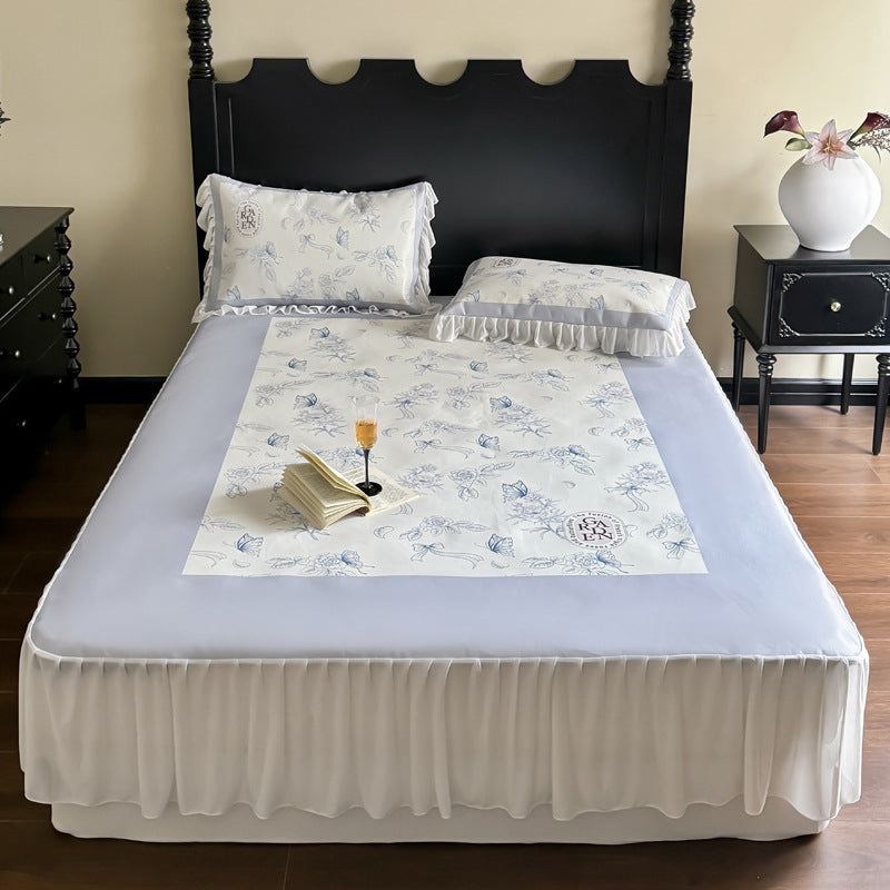 Bedding set with ruffled bed skirt, floral printed center piece and frill pillow