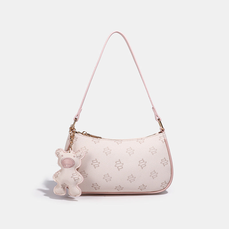 Stylish Handheld Purse with Unique Teddy Charm