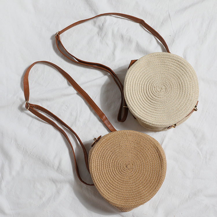 Round shoulder bag made of natural material with stylish accents Stornfield