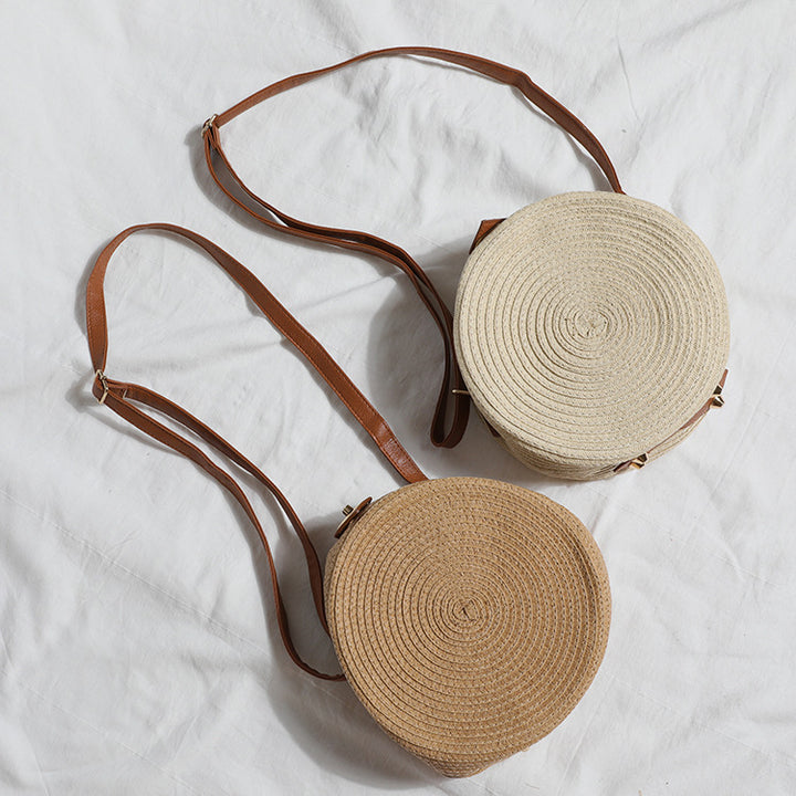 Round shoulder bag made of natural material with stylish accents Stornfield