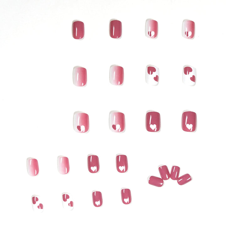 Creative nail art with heart motif and high-gloss finish Stornfield