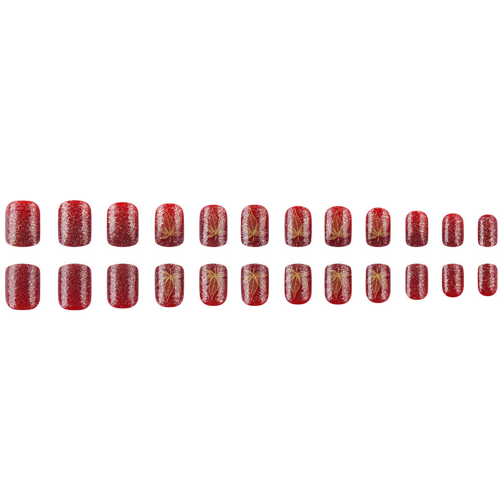 Artistic Leaf-Embellished Nail Art Design Stornfield