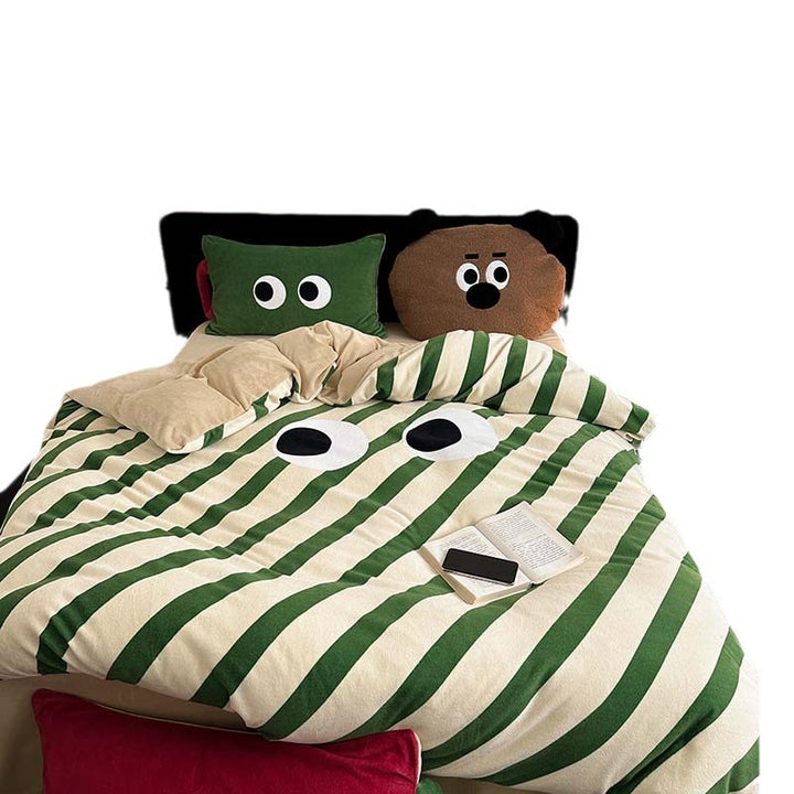 Bedding set with playful eye design and striped cotton linen