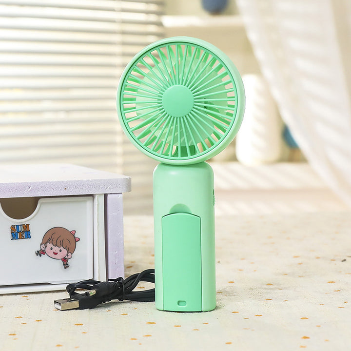 Women portable mini hand fan with USB charging function and ergonomic design Stornfield