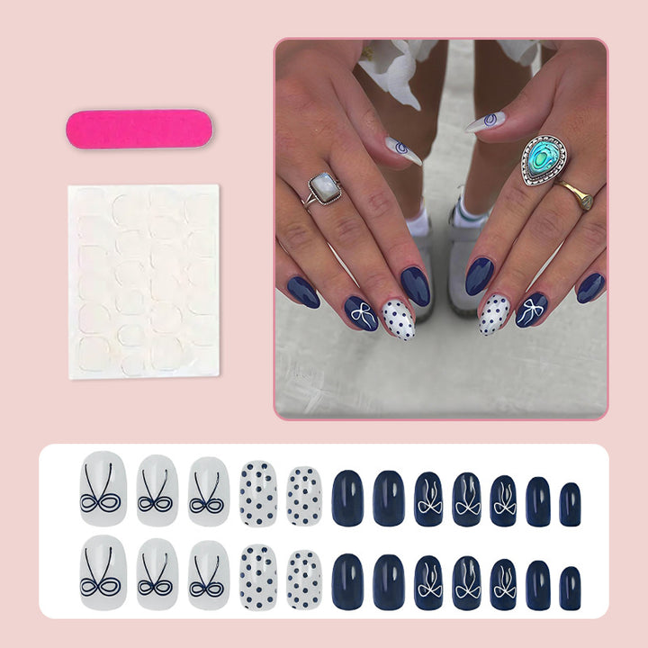 Nail set with stylish bows and dots Stornfield