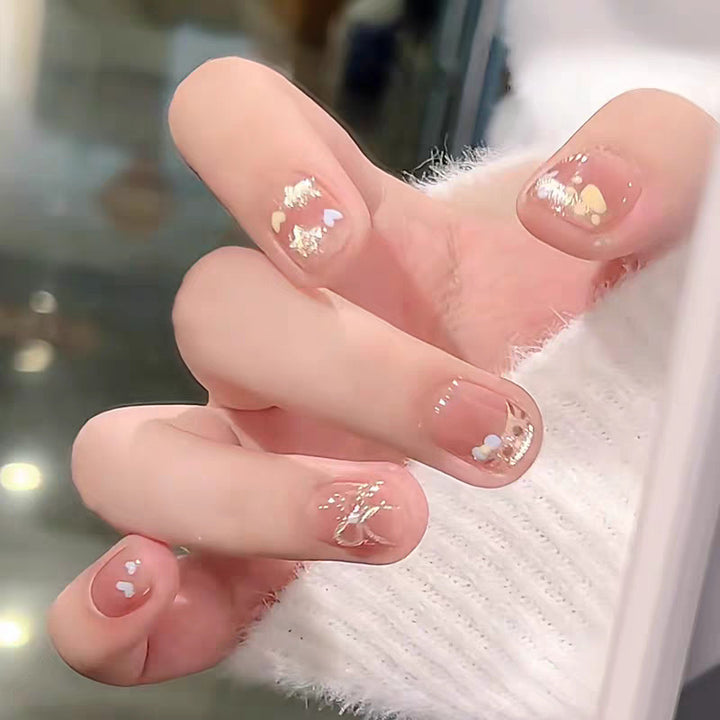 Artistic Press-On Nail Extensions with Floral Embellishments Stornfield