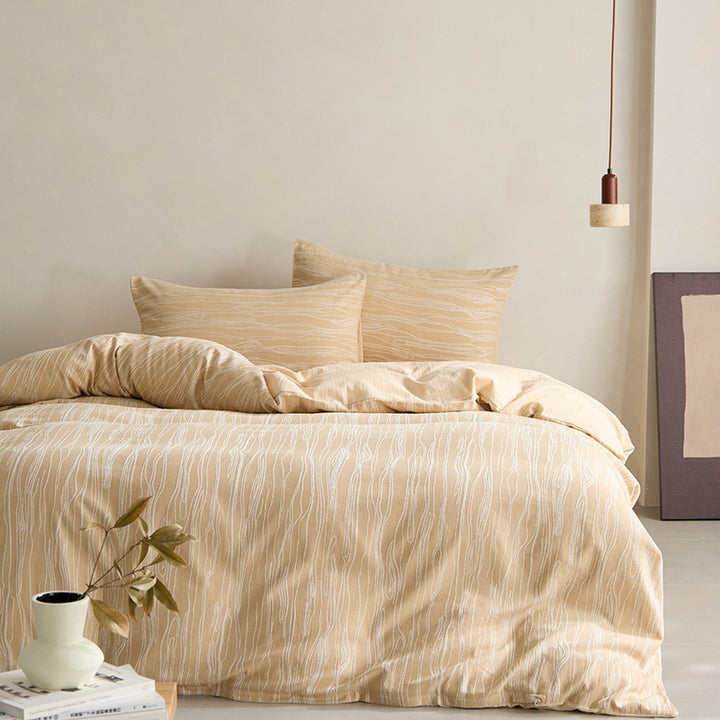 Modern bedding set made of cotton percale with organic stain pattern