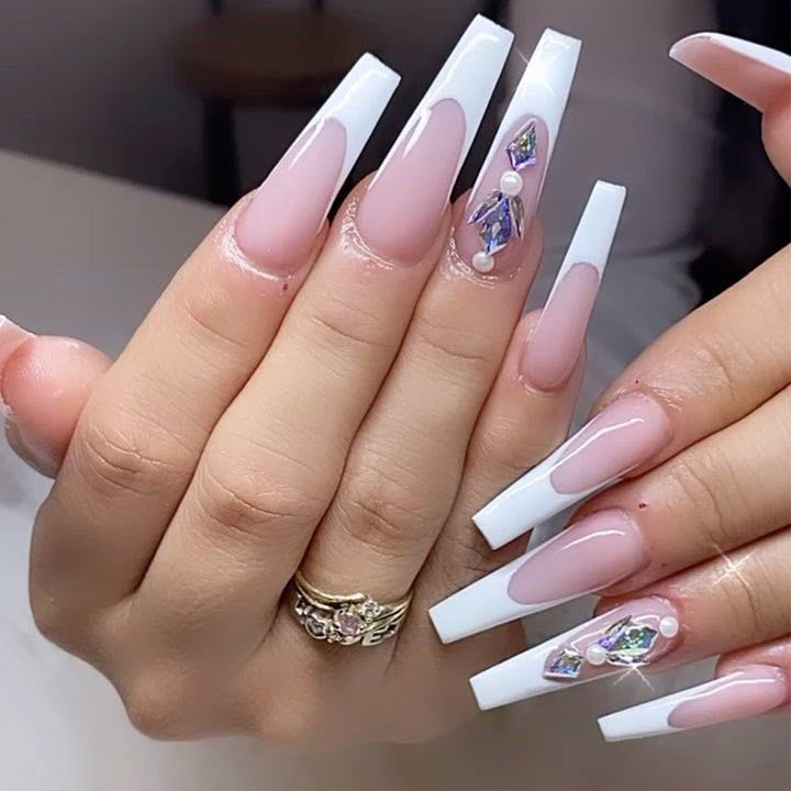 Premium Nail Extensions with Elegant Designs and Glitter Accents Stornfield