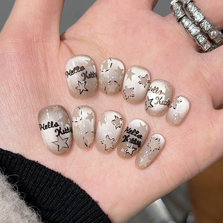 Artificial nail tips with Hello Kitty design Stornfield
