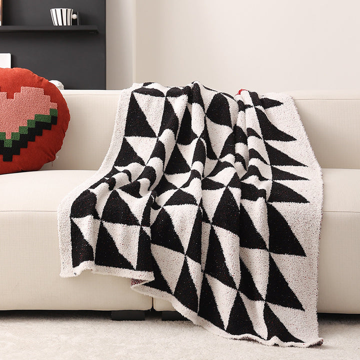 Coarsely woven decorative blanket with geometric jacquard pattern and soft bouclé Stornfield