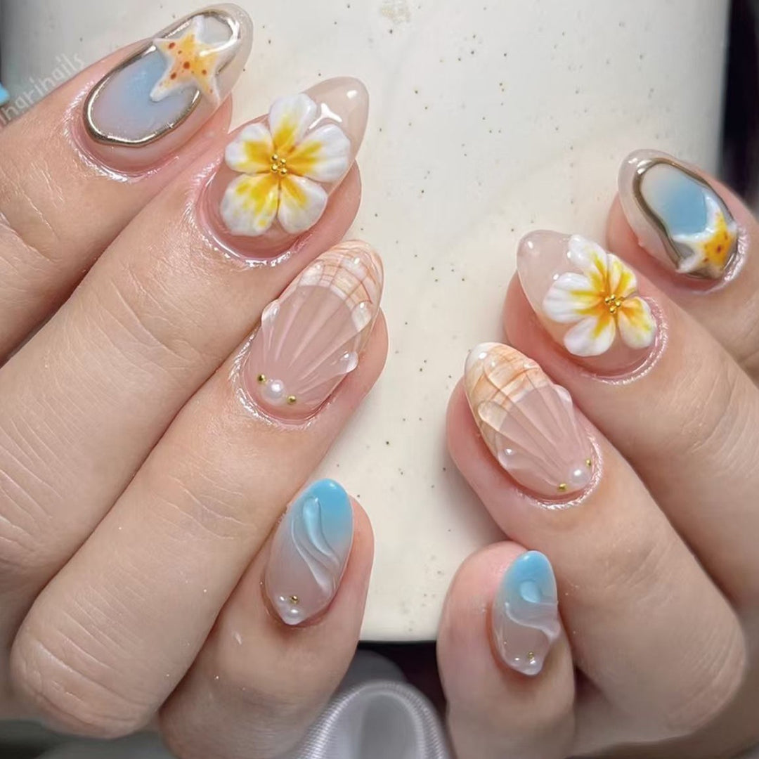 Artistic Nail Design Set with Floral and Seaside Accents Stornfield
