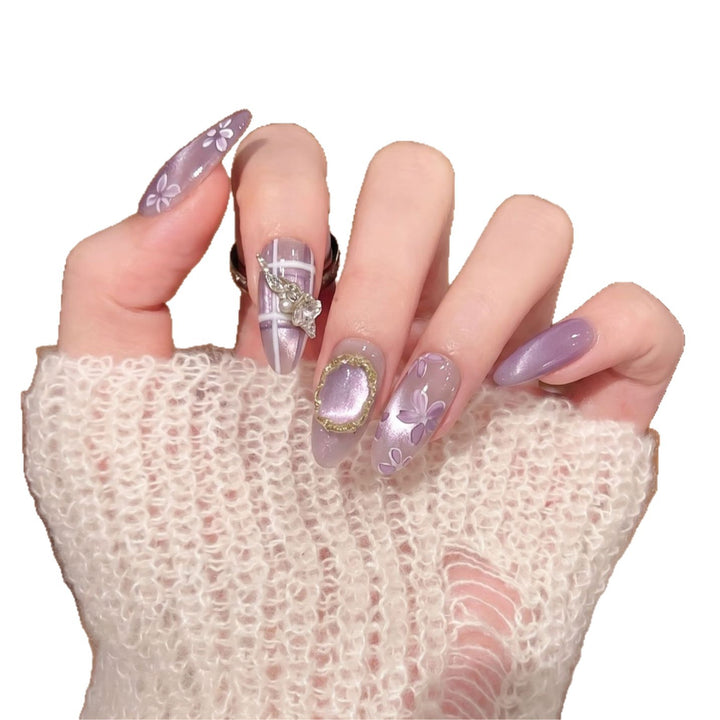 Artistic Press-On Nail Set with Floral Accents Stornfield