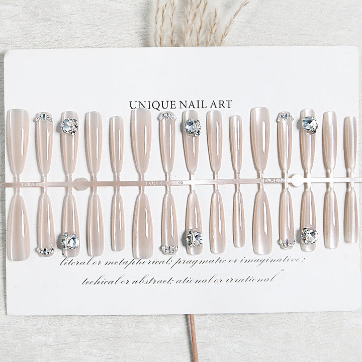 Acrylic nail set with glitter design and elegant 3D applications Stornfield