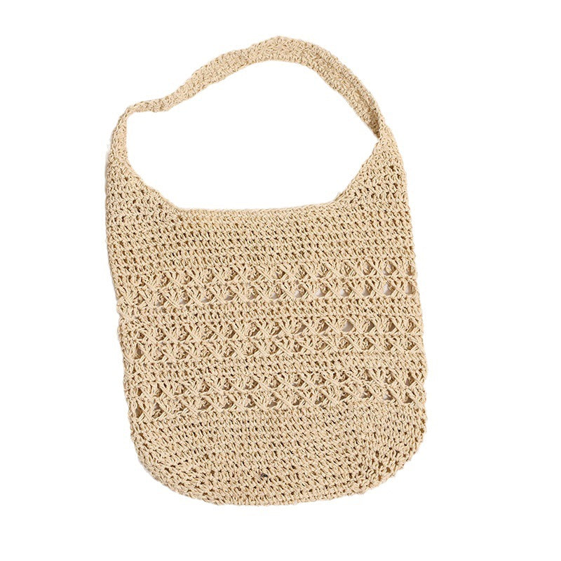 Crocheted shoulder bag with decorative hole pattern Stornfield