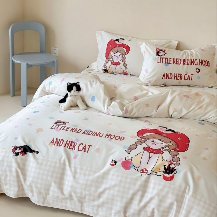 Bedding set for children made of cotton satin with contrasting piping and puppy print