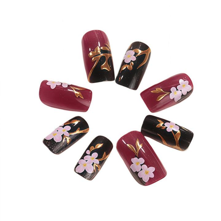 Artificial nails with elegant floral accents Stornfield