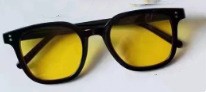Women striking retro sunglasses with yellow-tinted lenses Stornfield