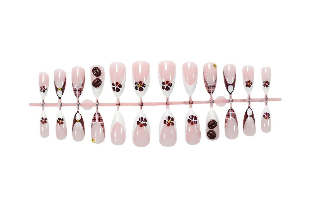 Art nail set with elegant coffee and flower motif Stornfield