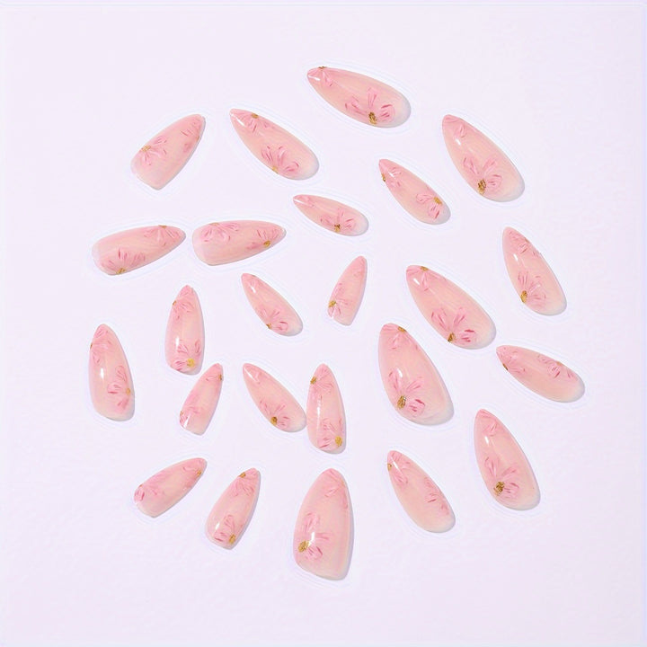 Artificial nail set with floral accents and gold embellishments Stornfield