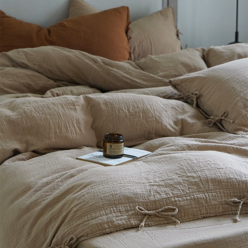 Natural linen bedding set with decorative ties and stonewashed texture