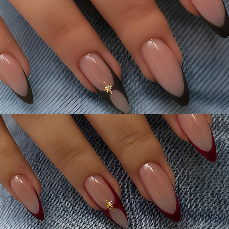 Acrylic nail set with elegant French tip and decorative accents Stornfield