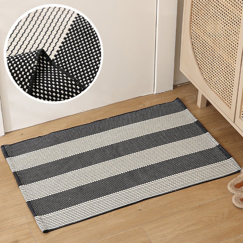 Flat striped carpet runner made of cotton blend with anti-slip coating and easy-care woven structure