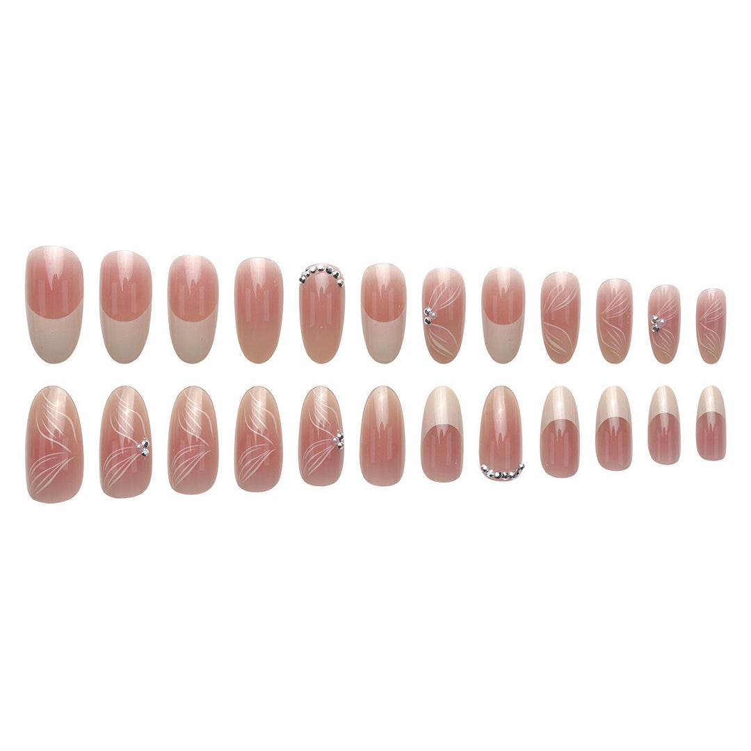 Elegant Long Stiletto Press-On Nails with Floral and Gem Accents Stornfield