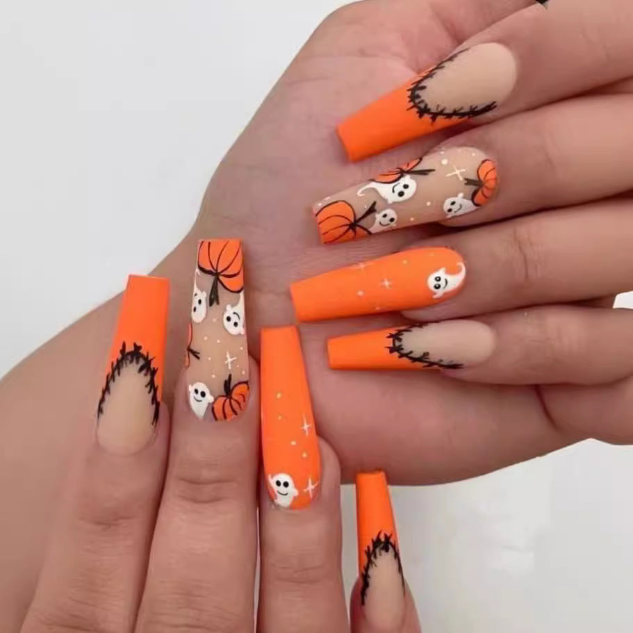 Artistic Press-On Nail Design with Dripping Effect Stornfield