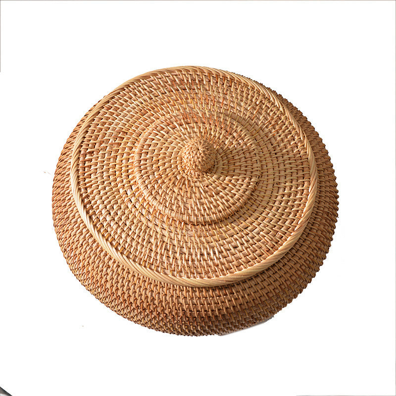Women's round storage basket made of woven natural material Stornfield