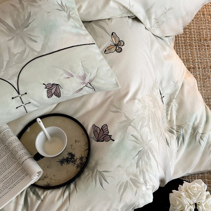 Bedding set with embroidered butterflies and delicate bamboo print