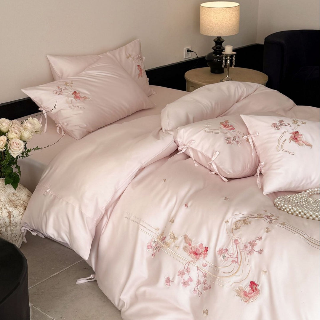 Embroidered satin bedding set with ribbon ties and delicate floral embroidery Stornfield