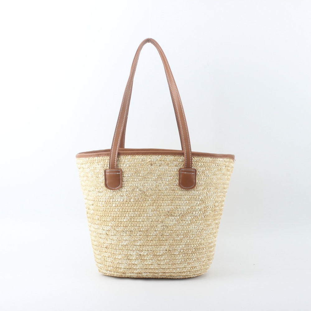 Braided basket bag with elegant leather handles Stornfield