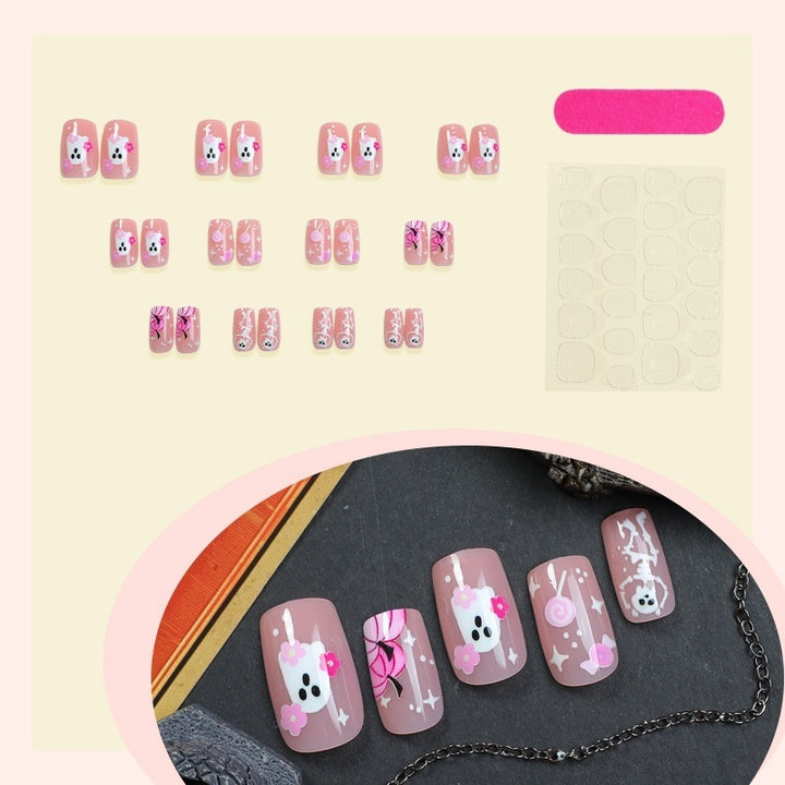 Acrylic nail set with creative animal and flower designs Stornfield
