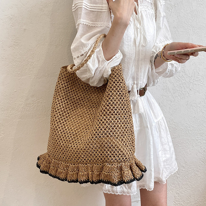 Handcrafted straw bag with fringed hem Stornfield
