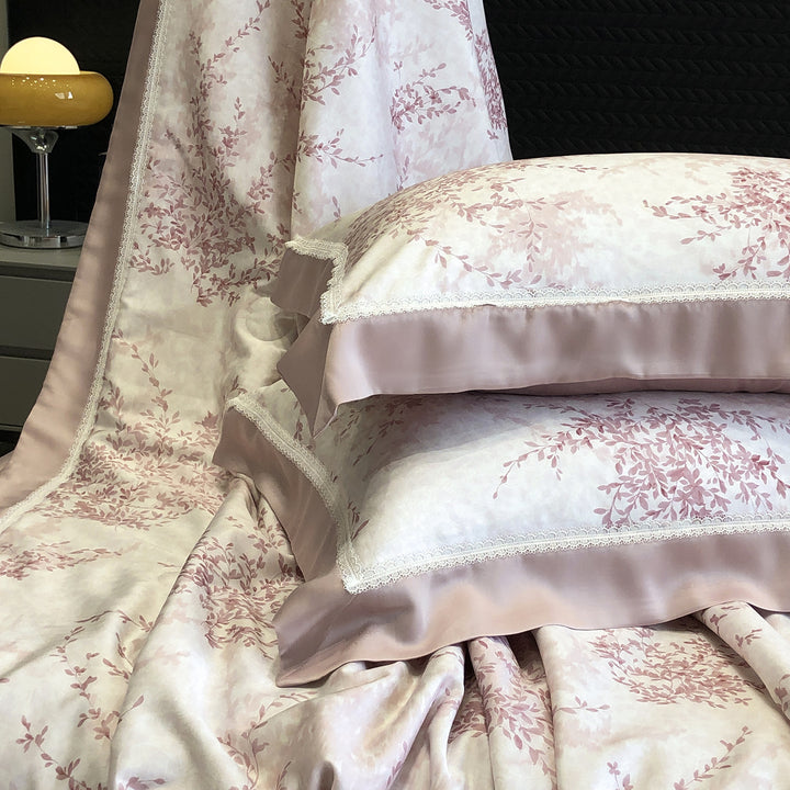 Pillowcase set made of cotton satin with delicate lace trim and satin piping