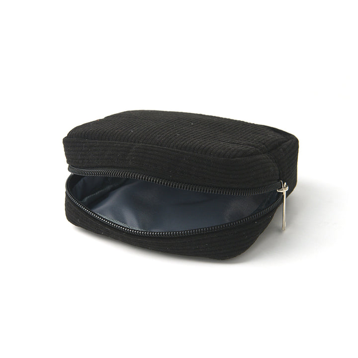 Cosmetic storage bag with structured surface Stornfield