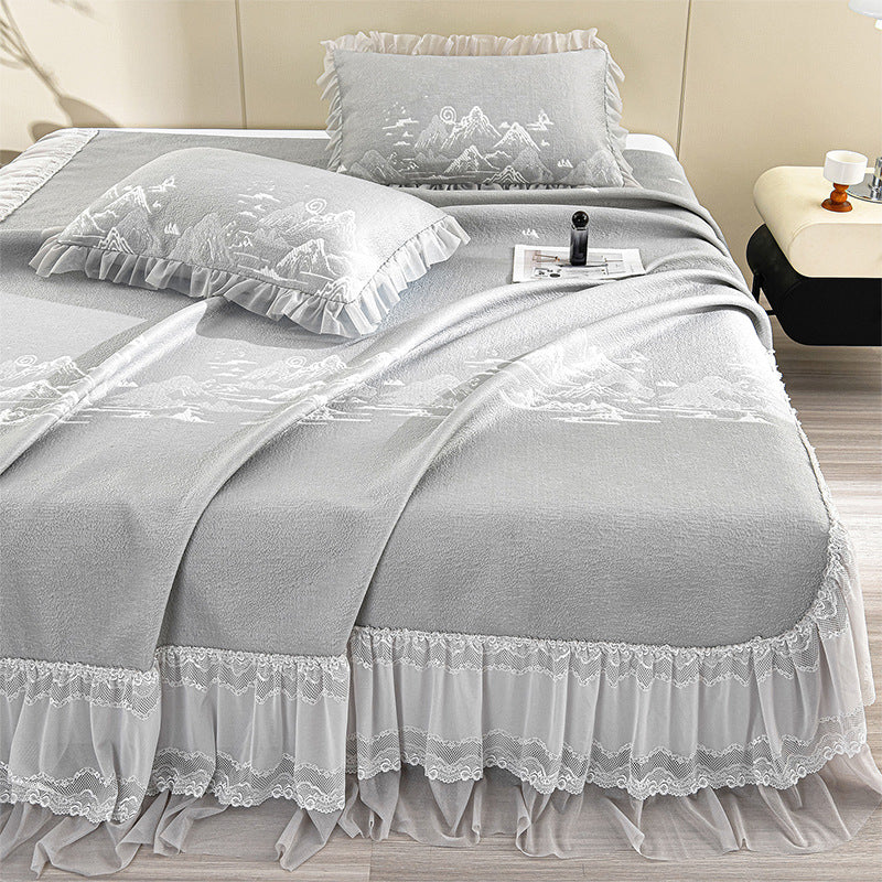 Elegant quilted bedspread with lace ruffle and mountain jacquard
