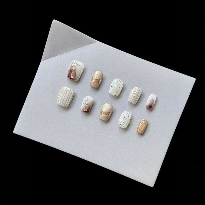 Elegant Decorative Press-On Nail Set with Gold and Marble Accents