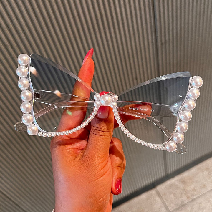 Women striking sunglasses with pearl decoration Stornfield
