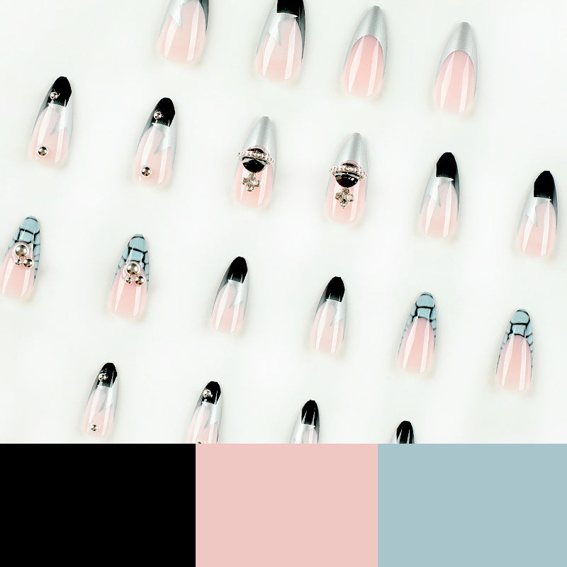 Artful acrylic nails with elegant 3D decorations and glitter effects Stornfield