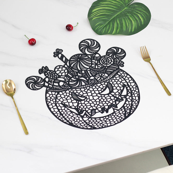 Filigree laser-cut pumpkin placemat made of wood for Halloween table decoration