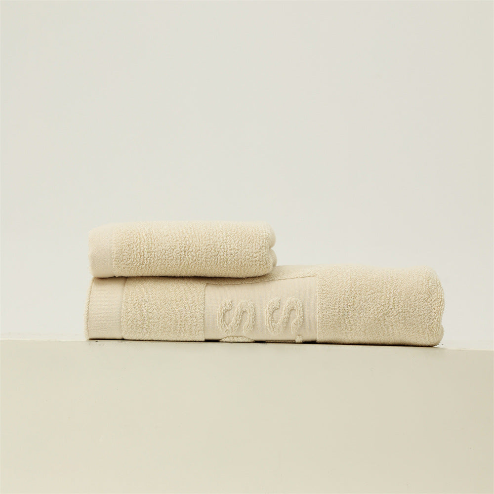 Luxury cotton terry towel set with logo border and extra soft Turquetto structure