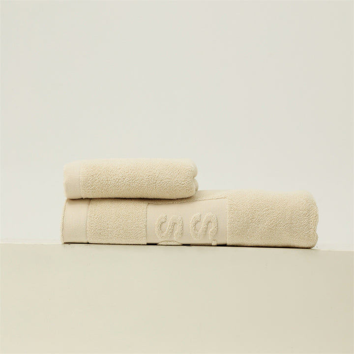 Luxury cotton terry towel set with logo border and extra soft Turquetto structure
