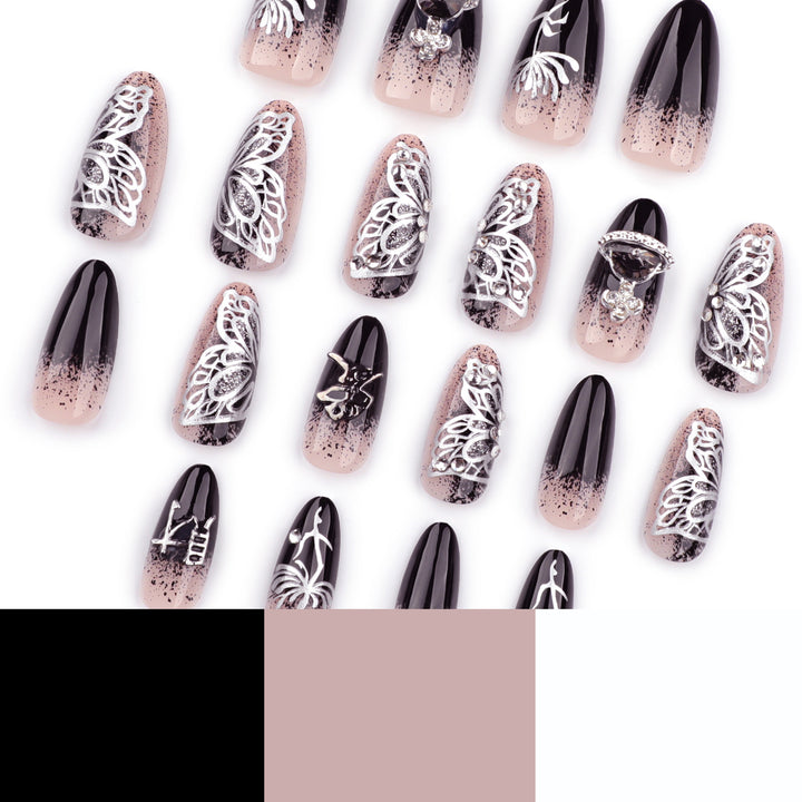 Artful stiletto nails with delicate embellishments and glamour accents Stornfield