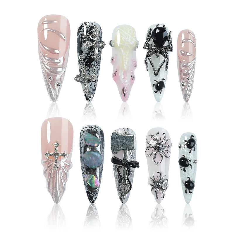 Creative nail art set with Halloween motifs and intricate details Stornfield